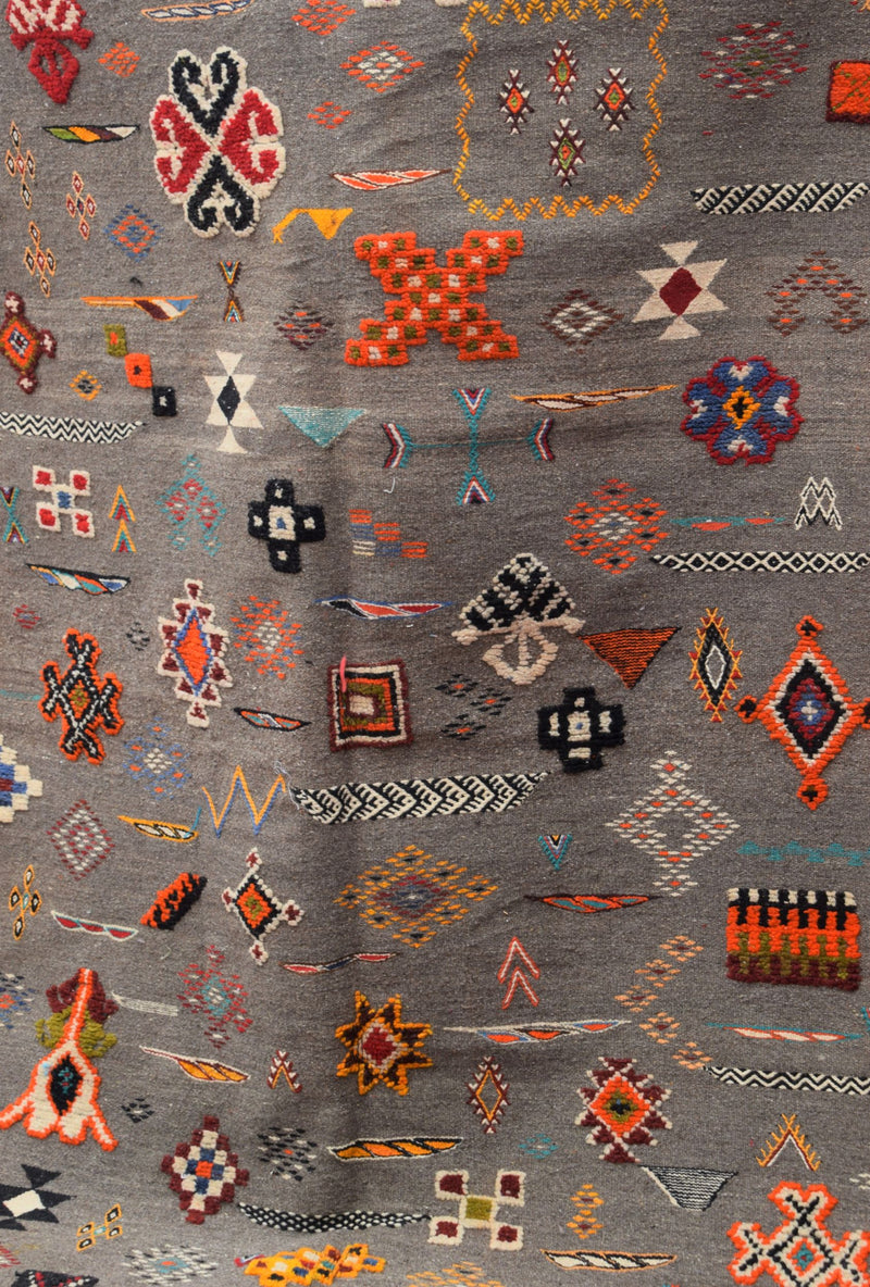 Multi-colour Taznakht rug with Amazigh symbols