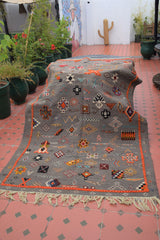 Multi-colour Taznakht rug with Amazigh symbols