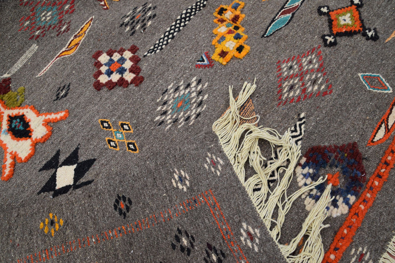 Multi-colour Taznakht rug with Amazigh symbols