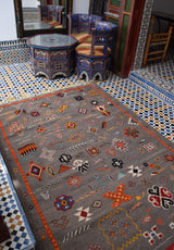 Multi-colour Taznakht rug with Amazigh symbols