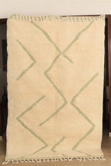 Minimalistic Beni Ouarin rug – olive green design on a cream background