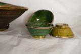 A set of four Green & Brown Tamegrout Bowls