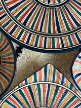 A set of two multi-coloured bowls and two plates