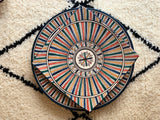 A set of two multi-coloured bowls and two plates